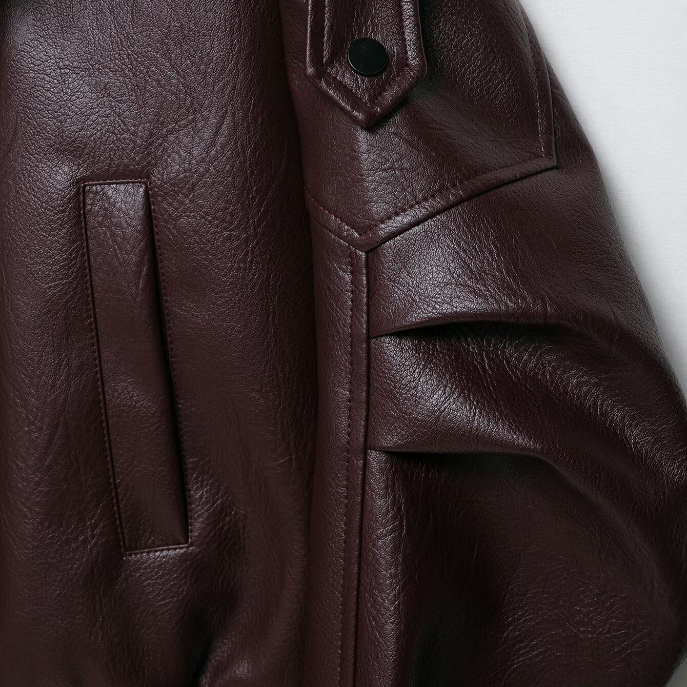 Solid color pleated cuff design PU jacket